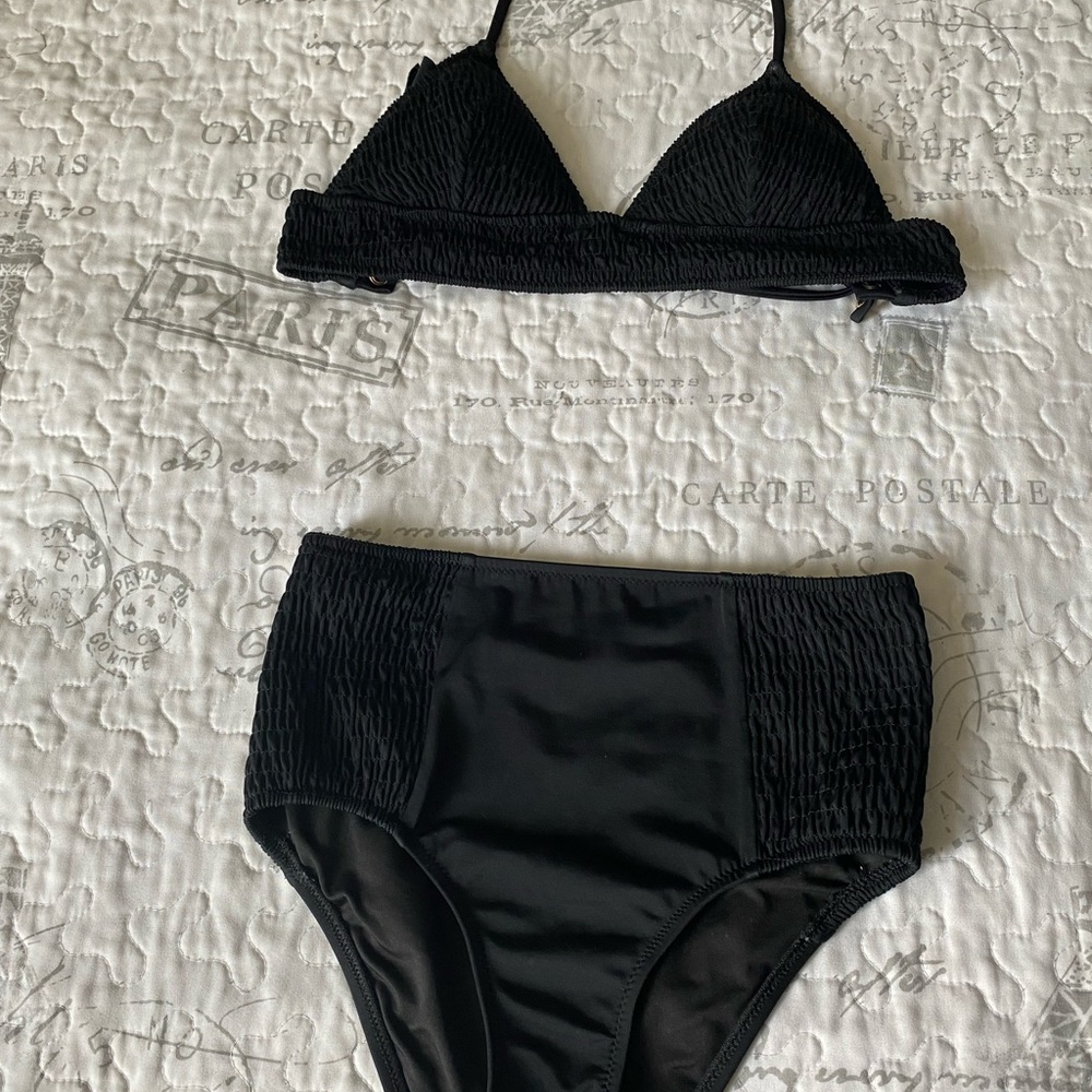 Black Victoria secret two piece swimsuit. Never been worn.